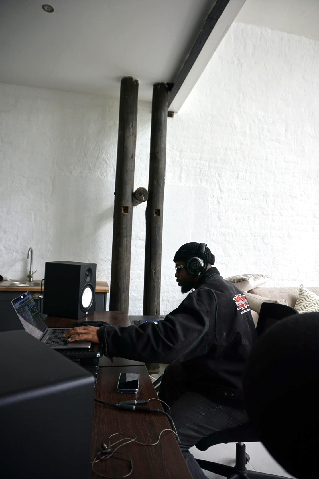 Manuchie at work in the studio